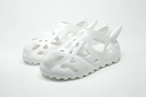 Esenes Worldwide Bone Head" Clog